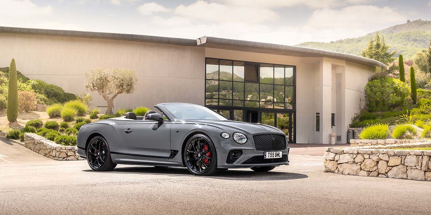 Bentley Manchester Bentley Continental GTC S convertible in Cambrian Grey paint front 34 static near house