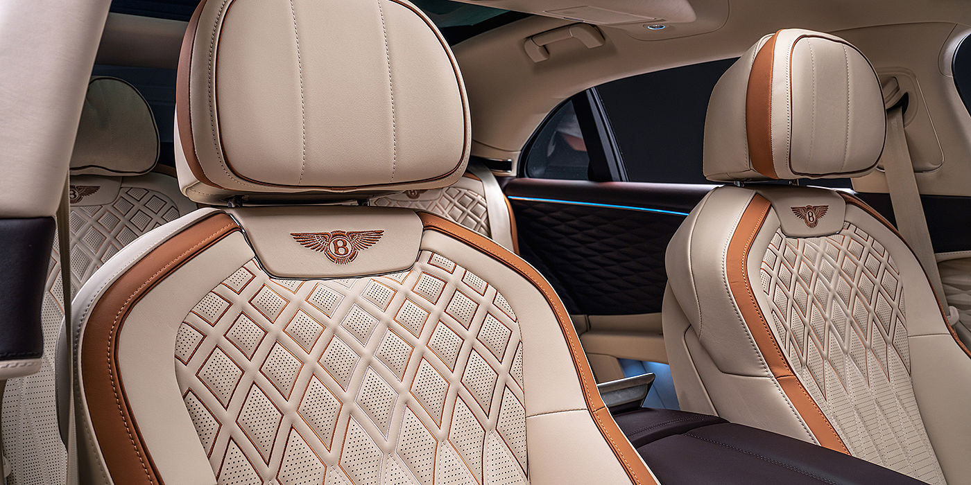 Bentley Manchester Bentley Flying Spur Odyssean sedan rear seat detail with Diamond quilting and Linen and Burnt Oak hides