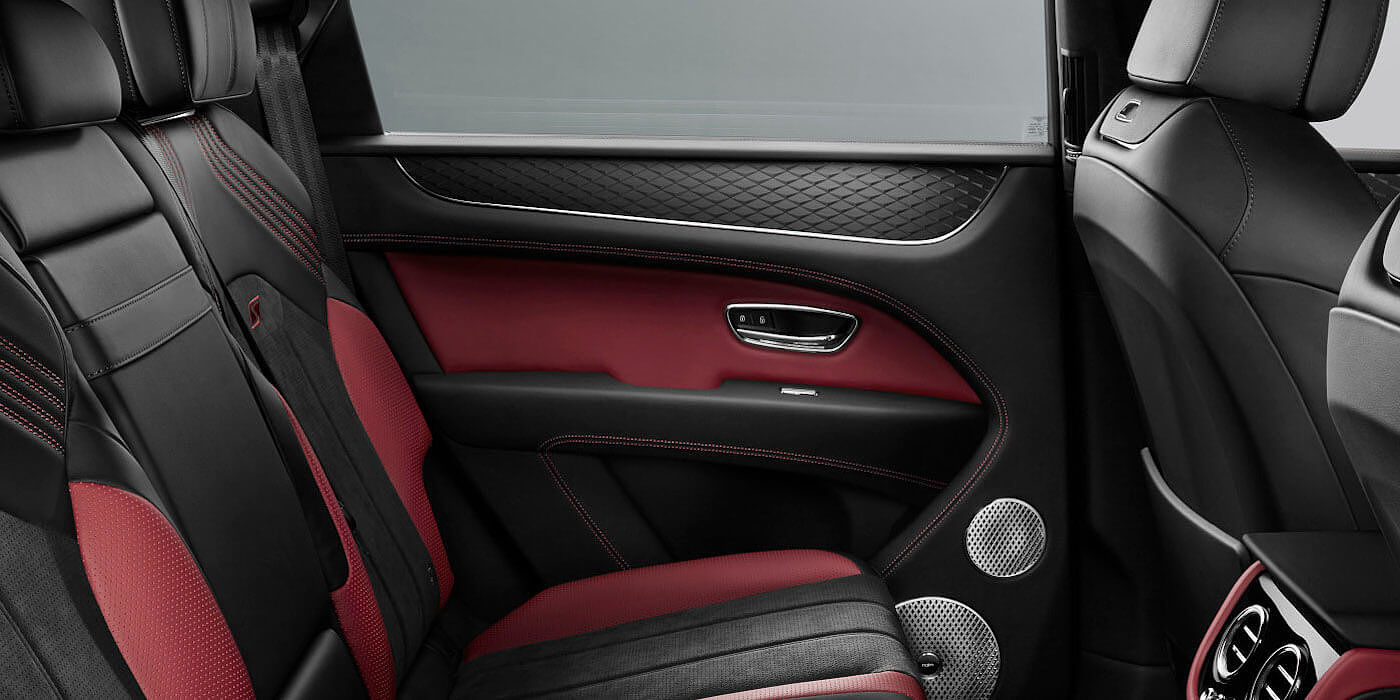 Bentley Manchester Bentley Bentayga S SUV rear interior in Beluga black and Hotspur red hide