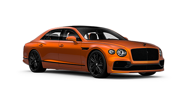 Bentley Manchester Bentley Flying Spur Speed front side angled view in Orange Flame coloured exterior. 