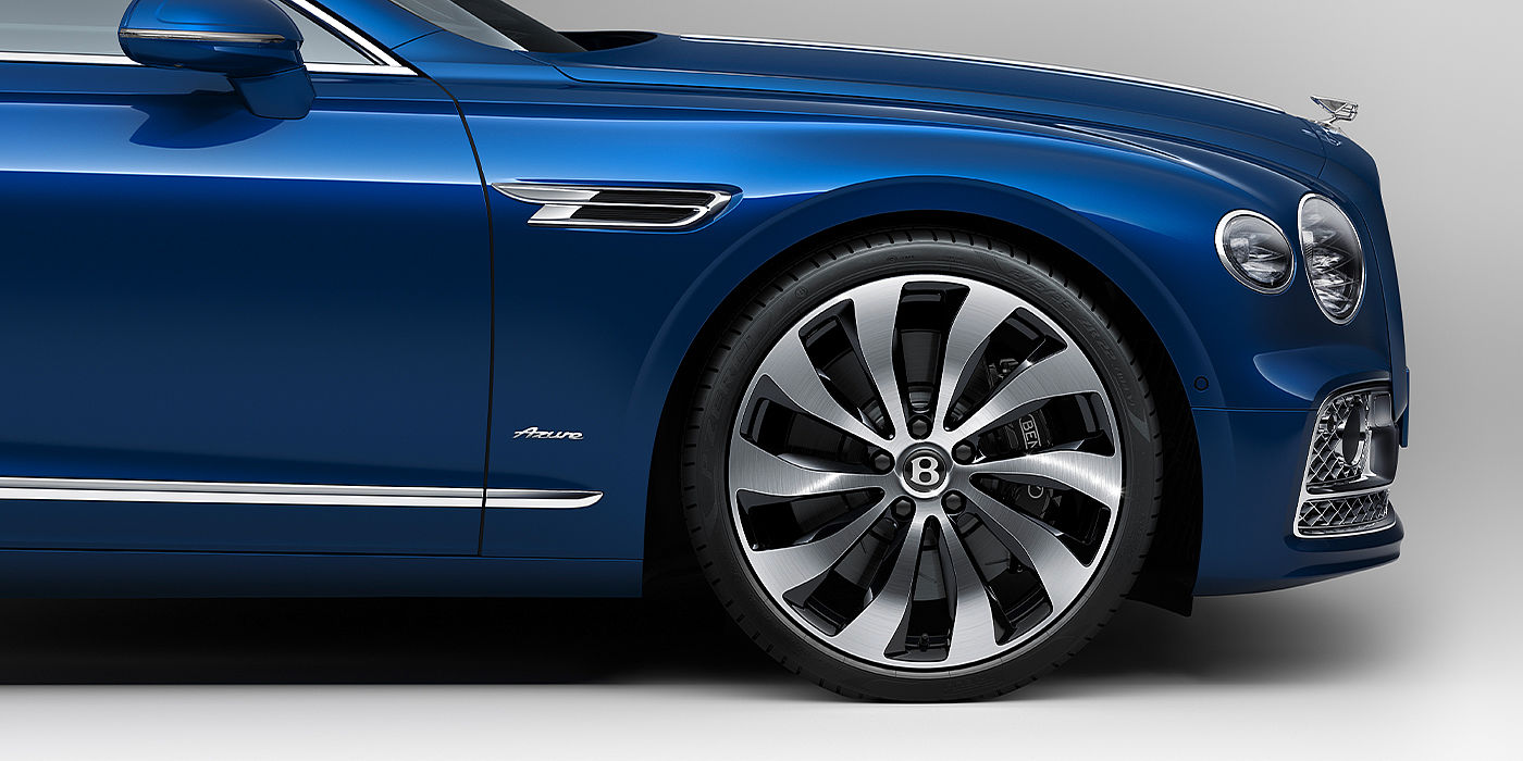Bentley Manchester Bentley Flying Spur Azure sedan side close up in Sequin Blue paint with Azure badge