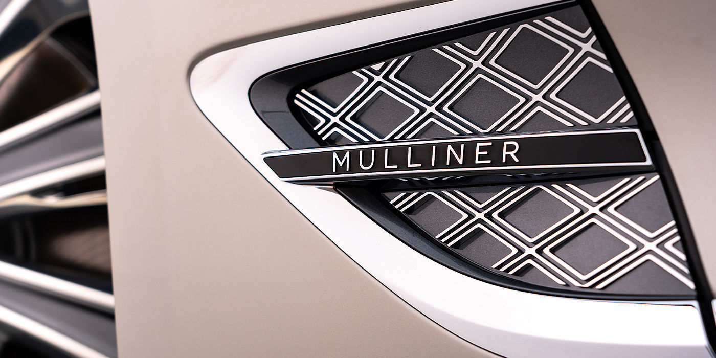 Bentley Manchester Bentley Continental GT Mulliner coupe in White Sand paint Mulliner wing vent close up